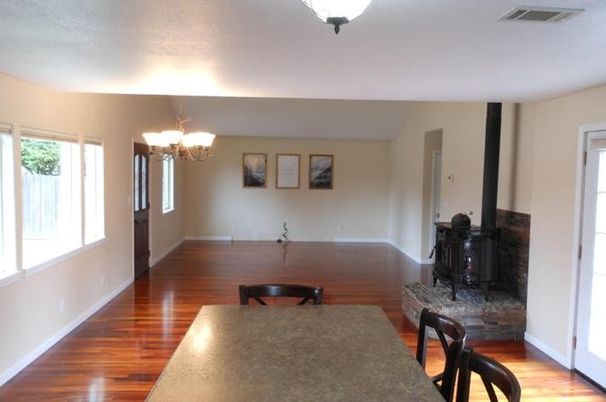 Chandelier, Dining room, Fireplace, Interior, Wood Texture Flooring