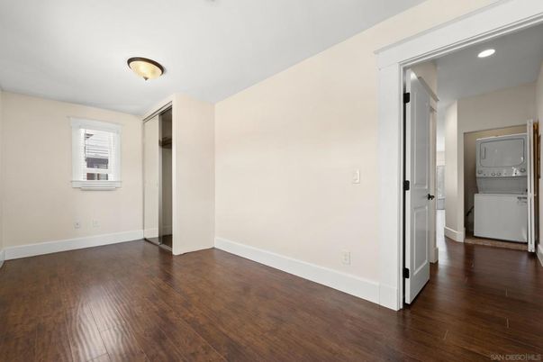 Empty room, Interior, Recessed Lighting, Utility Closets, Washer, Wood Texture Flooring
