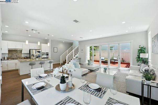Dining room, Interior, Kitchen, Living room, Pendant Lights, Recessed Lighting, Stainless Steel Appliances, Wood Texture Flooring