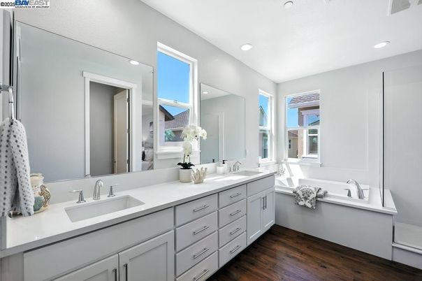 Bathroom, Dual Sink Vanities, Interior, Recessed Lighting, Wood Texture Flooring