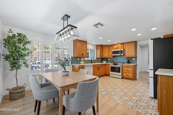Dining room, Interior, Kitchen, Pendant Lights, Recessed Lighting, Stainless Steel Appliances, Wood Texture Flooring