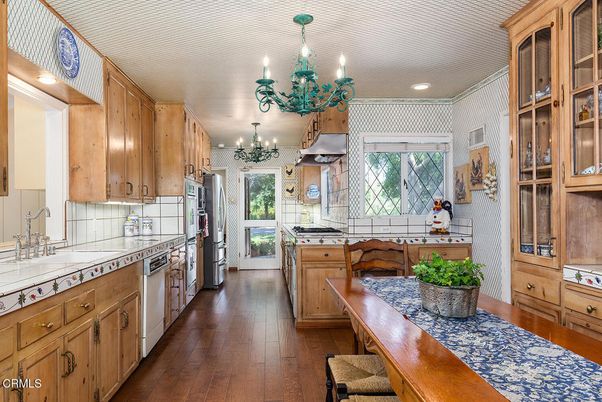 Chandelier, Interior, Kitchen, Recessed Lighting, Stainless Steel Appliances, Tile Countertops, Wood Texture Flooring