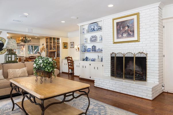 Chandelier, Dining room, Fireplace, Interior, Recessed Lighting, Stone Walls, Wood Texture Flooring