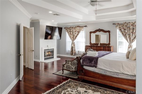 Bedroom, Fireplace, Interior, Recessed Lighting, Wood Texture Flooring