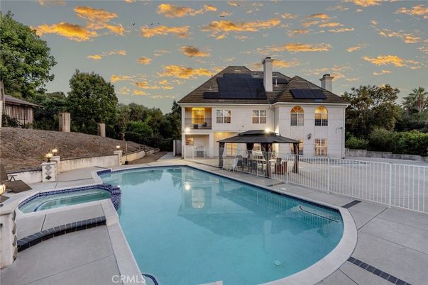 Exterior, Pool, Solar Panels
