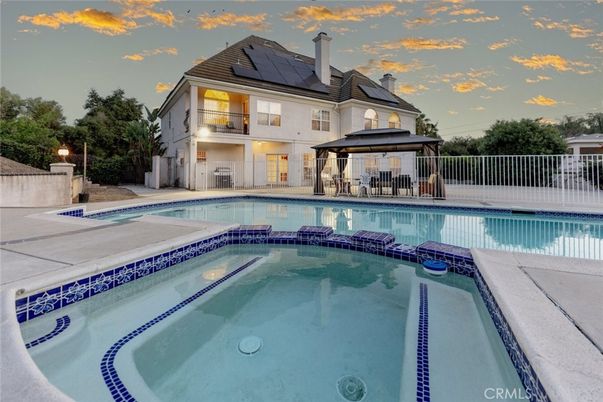 Exterior, Pool, Solar Panels