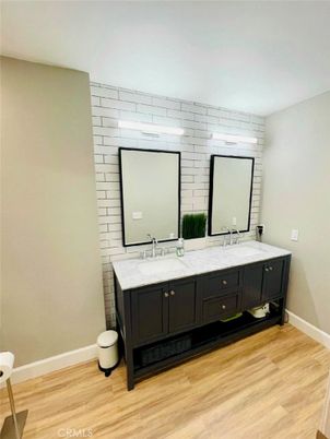 Bathroom, Dual Sink Vanities, Interior, Stone Walls, Wood Texture Flooring