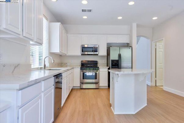 Interior, Kitchen, Recessed Lighting, Stainless Steel Appliances, Wood Texture Flooring
