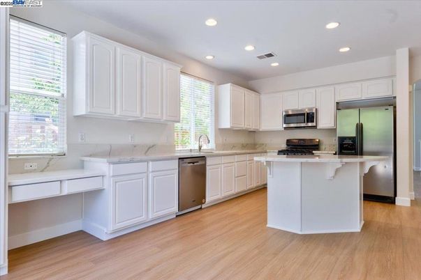 Interior, Kitchen, Recessed Lighting, Stainless Steel Appliances, Wood Texture Flooring