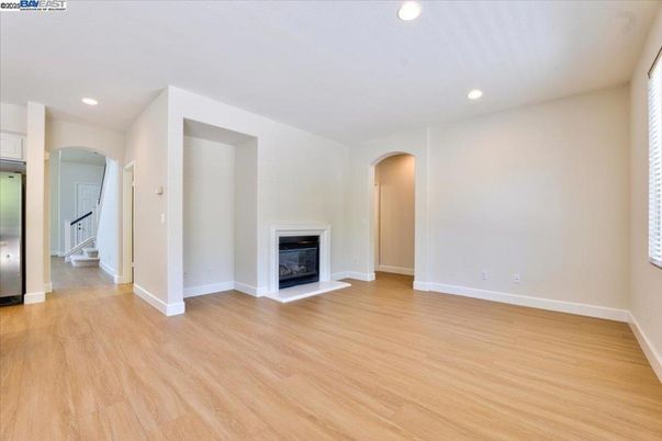 Empty room, Fireplace, Interior, Recessed Lighting, Wood Texture Flooring