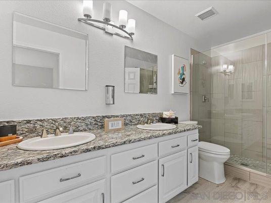 Bathroom, Dual Sink Vanities, Glass Shower, Interior, Wood Texture Flooring