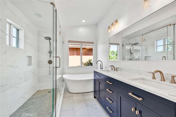 Bathroom, Dual Sink Vanities, Free Standing Baths, Glass Shower, Interior, Marble, Marble Walls, Recessed Lighting
