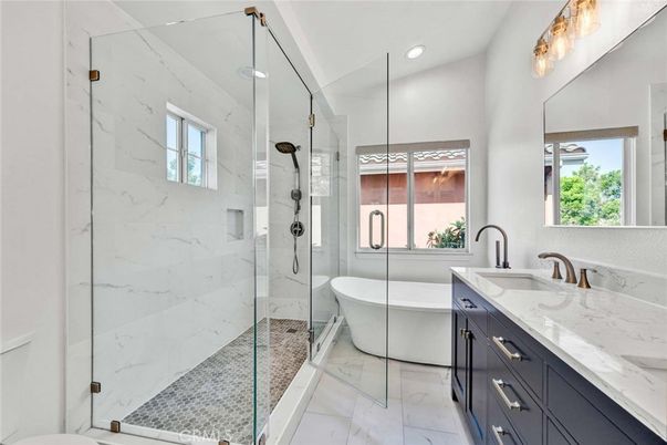 Bathroom, Dual Sink Vanities, Free Standing Baths, Glass Shower, Interior, Marble, Marble Walls, Recessed Lighting