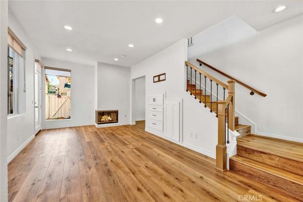 Empty room, Fireplace, Interior, Recessed Lighting, Wood Texture Flooring