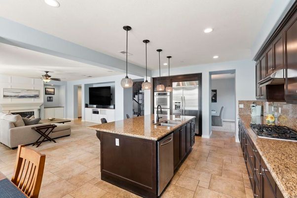Fireplace, Interior, Kitchen, Living room, Pendant Lights, Recessed Lighting, Stainless Steel Appliances