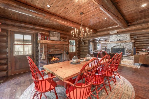 Chandelier, Dining room, Fireplace, Interior, Recessed Lighting, Wooden Beams, Wooden Ceilings, Wood Texture Flooring, Wooden Walls