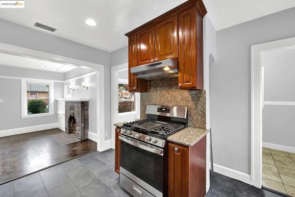 Fireplace, Interior, Kitchen, Recessed Lighting, Stainless Steel Appliances