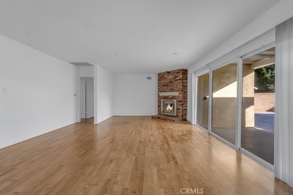 Empty room, Fireplace, Interior, Stone Walls, Wood Texture Flooring