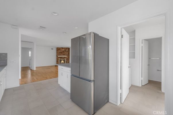 Fireplace, Interior, Kitchen, Recessed Lighting, Wood Texture Flooring