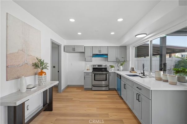 Interior, Kitchen, Recessed Lighting, Stainless Steel Appliances, Wood Texture Flooring