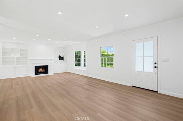 Empty room, Fireplace, Interior, Recessed Lighting, Wood Texture Flooring