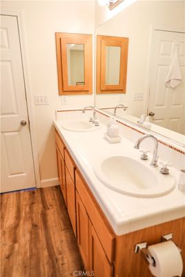 Bathroom, Dual Sink Vanities, Interior, Tile Countertops, Wood Texture Flooring