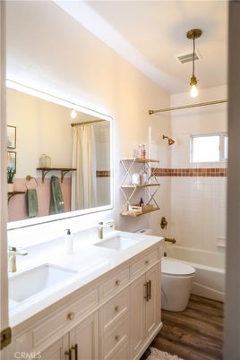 Bathroom, Dual Sink Vanities, Interior, Pendant Lights, Wood Texture Flooring