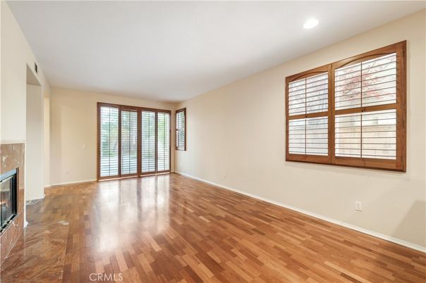Empty room, Fireplace, Interior, Recessed Lighting, Wood Texture Flooring