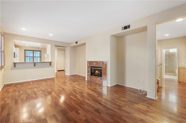 Empty room, Fireplace, Interior, Recessed Lighting, Wood Texture Flooring