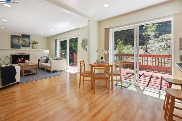 Dining room, Fireplace, Interior, Living room, Recessed Lighting, Wood Texture Flooring