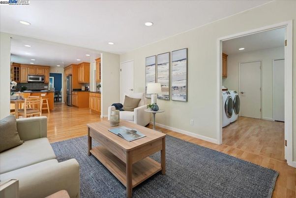 Dining room, Interior, Kitchen, Living room, Recessed Lighting, Washer, Wood Texture Flooring