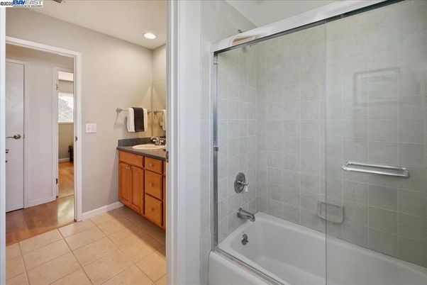 Bathroom, Glass Shower, Interior, Recessed Lighting, Wood Texture Flooring