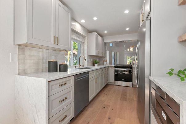 Interior, Kitchen, Recessed Lighting, Stainless Steel Appliances, Wood Texture Flooring