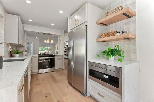 Chandelier, Interior, Kitchen, Pendant Lights, Recessed Lighting, Stainless Steel Appliances, Wood Texture Flooring