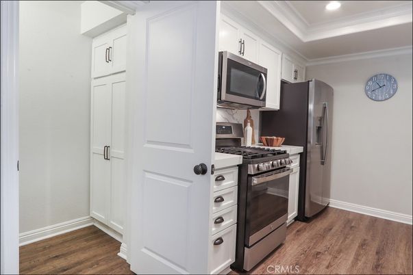 Interior, Kitchen, Recessed Lighting, Stainless Steel Appliances, Wood Texture Flooring