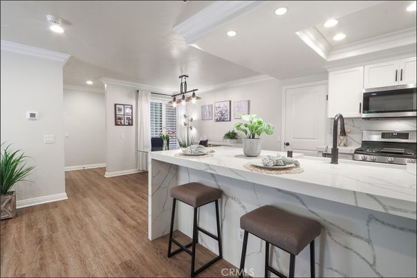Interior, Kitchen, Pendant Lights, Recessed Lighting, Stainless Steel Appliances, Wood Texture Flooring