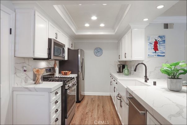 Interior, Kitchen, Recessed Lighting, Stainless Steel Appliances, Wood Texture Flooring