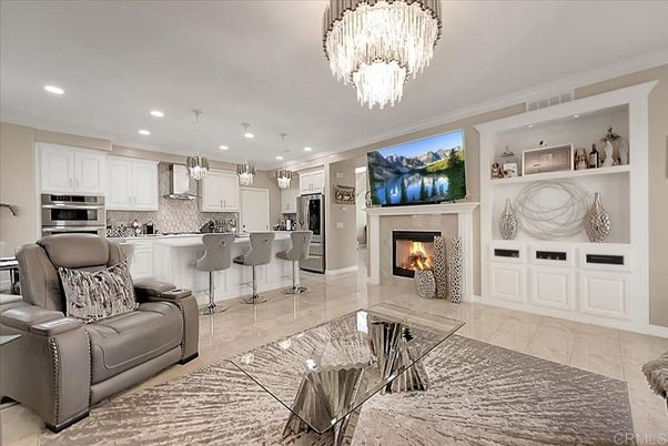Chandelier, Fireplace, Interior, Kitchen, Marble, Pendant Lights, Recessed Lighting, Stainless Steel Appliances