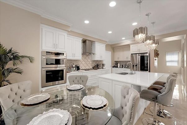 Chandelier, Dining room, Interior, Kitchen, Pendant Lights, Recessed Lighting, Stainless Steel Appliances