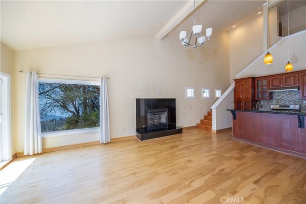 Chandelier, Fireplace, Interior, Kitchen, Pendant Lights, Recessed Lighting, Wood Texture Flooring
