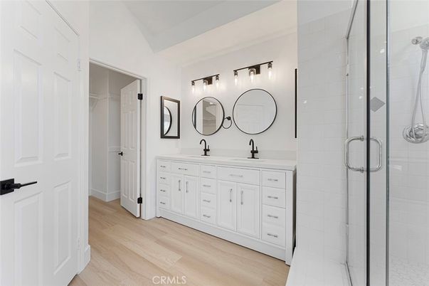 Bathroom, Dual Sink Vanities, Glass Shower, Interior, Wood Texture Flooring