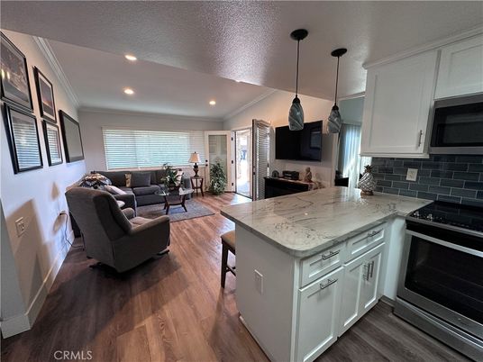 Interior, Kitchen, Living room, Pendant Lights, Recessed Lighting, Stainless Steel Appliances, Wood Texture Flooring
