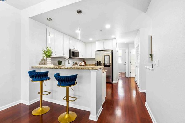 Interior, Kitchen, Pendant Lights, Recessed Lighting, Stainless Steel Appliances, Wood Texture Flooring