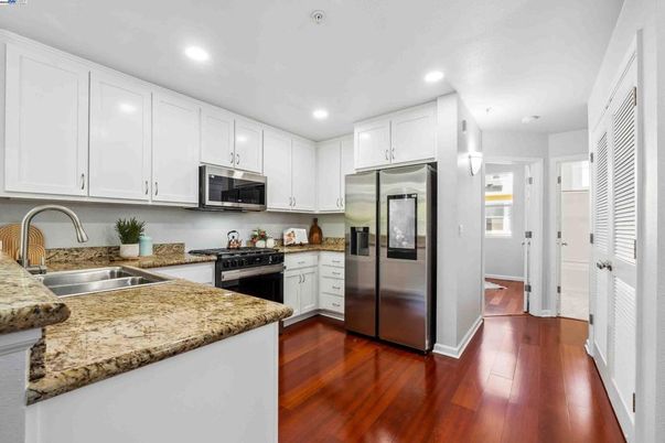 Interior, Kitchen, Recessed Lighting, Stainless Steel Appliances, Wood Texture Flooring