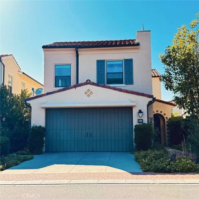 Attached, Exterior, Facade, Spanish Mediterranean