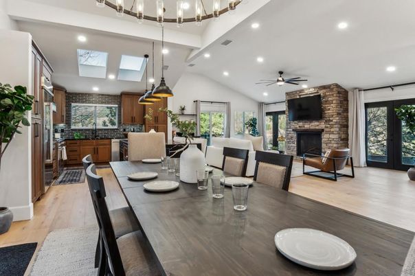 Dining room, Fireplace, Interior, Living room, Pendant Lights, Recessed Lighting, Stone Walls, Wood Texture Flooring
