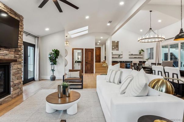 Dining room, Fireplace, Interior, Living room, Pendant Lights, Recessed Lighting, Wood Texture Flooring