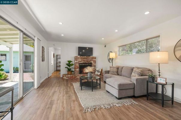 Fireplace, Interior, Living room, Recessed Lighting, Wood Texture Flooring