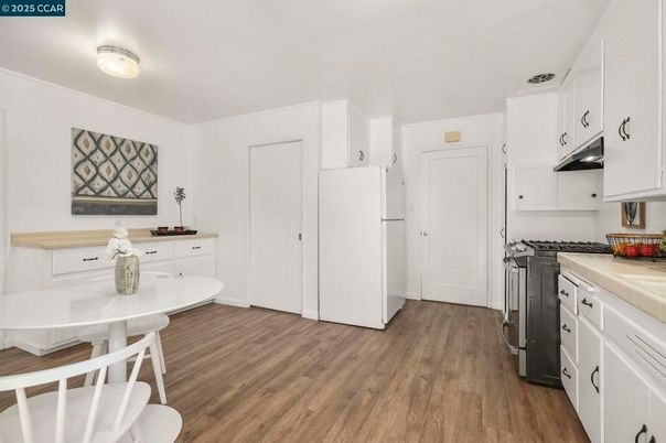Interior, Kitchen, Tile Countertops, Wood Texture Flooring