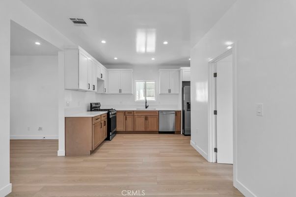 Interior, Kitchen, Recessed Lighting, Stainless Steel Appliances, Wood Texture Flooring